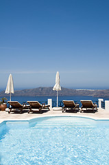 Image showing swimming pool view of volcanic island imerovigli santorini greec