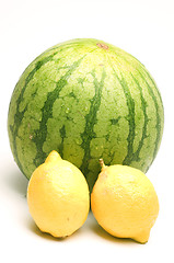 Image showing personal size watermelon and two lemons