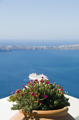 Image showing view of volcanic islands of santorini greece and cruise ship in 