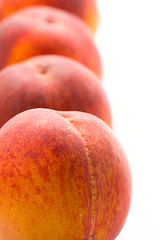 Image showing four peaches