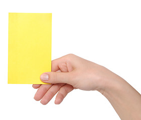 Image showing yellow card in a hand