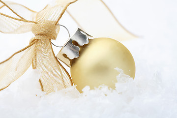 Image showing Gold Christmas bauble decoration with ribbon.