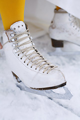 Image showing Close-up of an ice skate on a female foot.