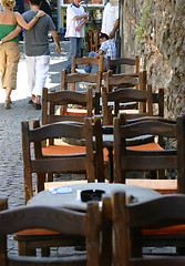 Image showing Couple walking in downtown bars street