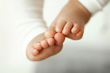 Image showing Close-up of a baby’s feet.