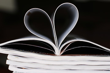 Image showing Heart shaped folded magazine.