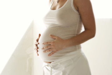 Image showing Woman holding her pregnant belly.