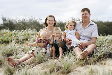 Image showing Family enjoying themselves at the beach.