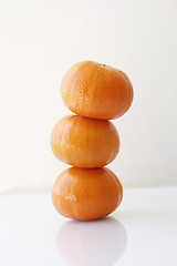 Image showing Stack of mandarins.