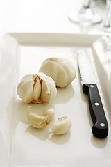 Image showing Garlic on a white plate.