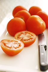 Image showing Fresh tomatoes on a white plate.