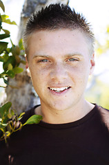 Image showing Portrait of a happy young man outdoors.