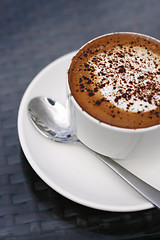 Image showing Delicious cappuccino in a white cup.