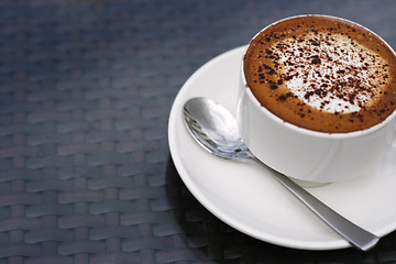 Image showing Delicious cappuccino in a white cup.