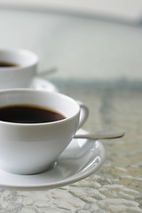 Image showing Two black filter coffees in white cups.