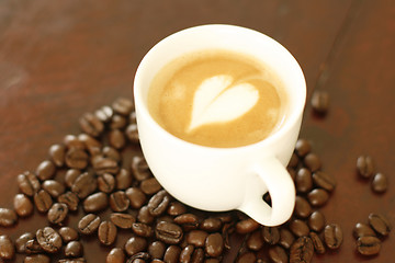 Image showing Piccolo latte with a heart shaped coffee art design.