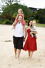 Image showing Family enjoying themselves in an outdoor nature setting.