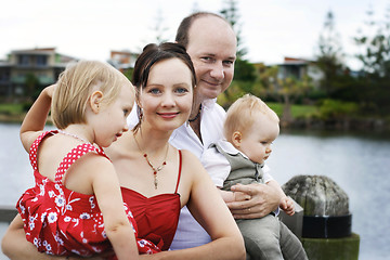 Image showing Family enjoying themselves in an outdoor nature setting.