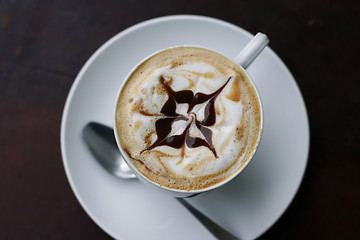 Image showing Delicious cappuccino with star design.