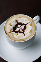 Image showing Delicious cappuccino with star design.