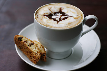 Image showing Delicious cappuccino with star design.