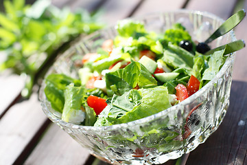 Image showing Fresh garden salad on a table.