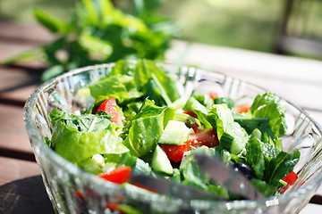 Image showing Fresh garden salad on a table.