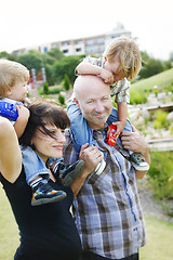 Image showing Happy family outdoors.