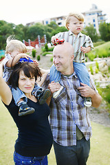 Image showing Happy family outdoors.