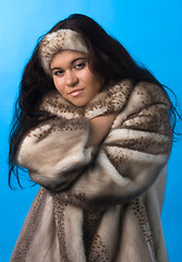Image showing young woman in fur coat