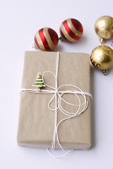 Image showing Simply wrapped Christmas gift.