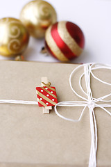 Image showing Simply wrapped Christmas gift.