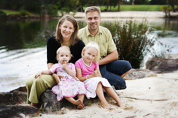 Image showing Family enjoying themselves in an outdoor nature setting.