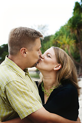 Image showing Portrait of a happy married couple kissing.