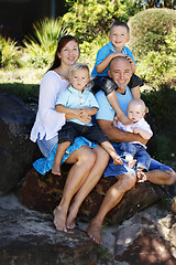 Image showing Family enjoying themselves in an outdoor nature setting.