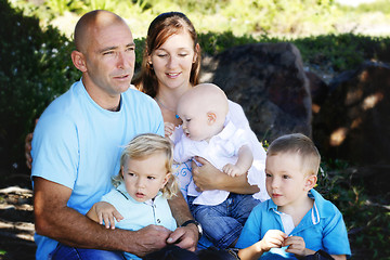 Image showing Family enjoying themselves in an outdoor nature setting.