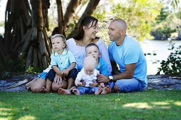 Image showing Family enjoying themselves in an outdoor nature setting.