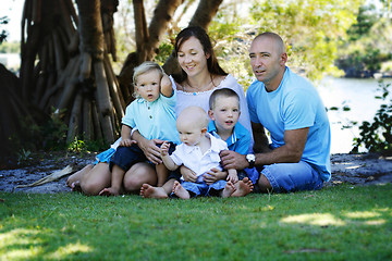 Image showing Family enjoying themselves in an outdoor nature setting.