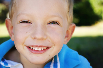 Image showing Close-up portrait of a happy young boy.