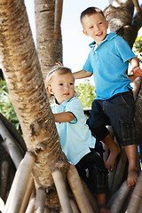 Image showing Two happy brothers together outdoors.