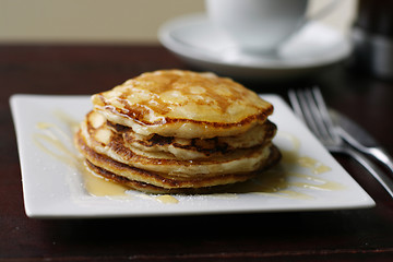 Image showing Stack of pancakes and coffee cup.