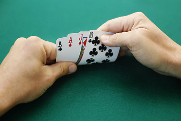Image showing Aces and Jack Ten Double Suited.