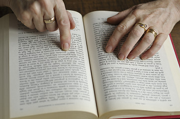 Image showing Reading a book