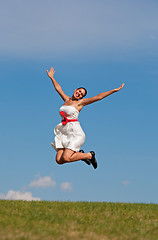 Image showing Smiling Jumping Girl