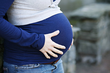 Image showing Close-up of woman's pregnant belly.
