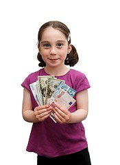 Image showing Smiling cute girl holds a fan of banknotes isolated