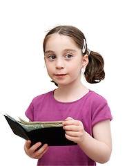 Image showing Smiling cute girl holds a wallet