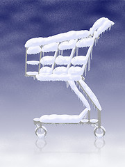 Image showing Snowy frozen shopping cart with icicles