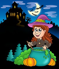 Image showing Wizard girl with haunted house