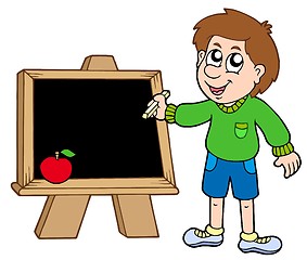 Image showing School boy writing on blackboard